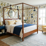Patterned wallpaper featuring a lemony yellow and blue floral design, interspersed with dog illustrations.