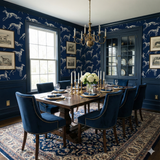 Nightstride Whippets Wallpaper with grey dog pattern on navy blue, covering a dining room with dark wood furniture.