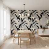 Midnight Grove wallpaper with black and beige leaf pattern covering a dining room wall.
