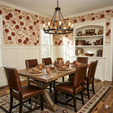 Floral wallpaper with carnation pattern from York Wallcoverings, covering the upper wall above white wainscoting in a dining room setting.
