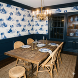 Cloudborne Persians Wallpaper with a repeating blue dog pattern on a white background.