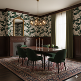 Magnolia print wallpaper with a white and green pattern, covering the walls in a traditional dining room.