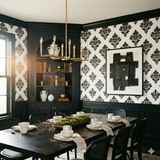 Blackwell Cartouche Wallpaper with damask print, in a dining room setting.