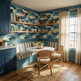 Tidal Force Wallpaper, featuring a blue and white ocean wave pattern, covering a breakfast nook with dining furniture and coastal decor.