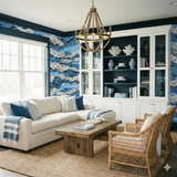 Static Tide Wallpaper with blue wave pattern, covering the walls in a coastal-themed living room.

