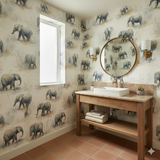 Sand and memory wallpaper with an elephant pattern, decorating a bathroom.
