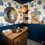 Jalisco Dry wallpaper featuring tequila agave plant graphics, paired with golden leaves and sketched liquor glasses.

