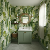 Green leaf pattern wallpaper with a tropical aesthetic, set in a modern bathroom.