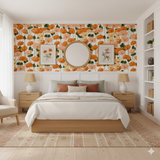 Poppy wallpaper by Marabella, decorating a bedroom above a white wainscot wall.