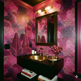 Garnet Nebula Wallpaper with abstract stippled pattern of pinks, purples and black on a dark background.
