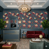 Crimson Aviary Drift Wallpaper with a floral pattern on a dark teal backdrop.
