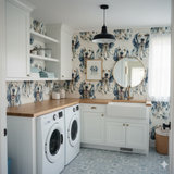 Patterned Mariner’s Field Wallpaper with a dog design, covering the walls of a laundry room.