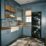 Blue wallpaper featuring dog motif, no brand provided, covering the walls of a laundry room.
