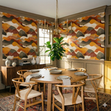 Patterned Cinderbrush Wallpaper with wavy lines and a colorful design, covering the walls of a dining room.
