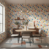 Colorful Paloma Fiesta Wallpaper with a terrazzo pattern on the wall.