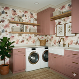 Floral Mira Drift wallpaper with a watercolor botanical pattern.
