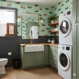 Clubhouse Run wallpaper with golf cart pattern, from York Wallcoverings, in a mint-green laundry room.
