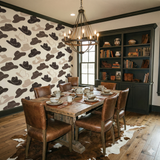 Cowboy hat wallpaper with a pattern of brown and white hats, covering a dining room wall.