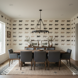 Laramie Row Wallpaper with cow pattern on the walls of a dining room.