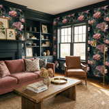 Quiet Garden wallpaper with floral pattern, on a dark green wall in a traditional living room.
