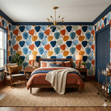 Terra Clay Collage Wallpaper with abstract shapes and botanical accents, styled in a mid-century modern bedroom.