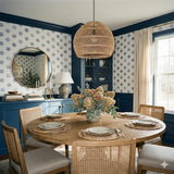 Fairway Index Wallpaper with a dot pattern on the wall, complemented by a mirror, lighting, and furniture.