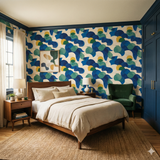 Blue and green Pacific Pulse Wallpaper with abstract shapes by York Wallcoverings, showcasing a modern bedroom setting.