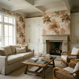 Palmera Sundrift wallpaper with a palm tree pattern on an accent wall in a living room.
