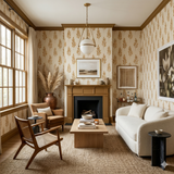 Aurelian Sheaf wallpaper with wheat pattern, in a warm beige color, covering the living room walls.
