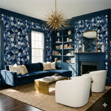 Midnight Littoral wallpaper with blue petal pattern on walls, by Wallpaper, in a styled living room.