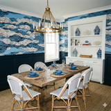 Static Tide Wallpaper with blue and white wave pattern, displayed on the walls of a dining room.
