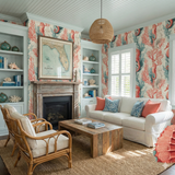 Coralbound wallpaper with a seahorse and coral pattern, covering the walls of a living room.