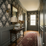 Midnight Palmette wallpaper in a dark floral print on the hallway walls.
