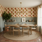 Sonoran Embershade Wallpaper with cactus motif by Chasing Paper, displayed on a dining room wall.
