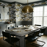 Clouded Shore wallpaper with a floral pattern, in hues of grey, white, and gold.
