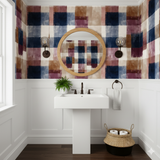 Ashbury Plaid Wallpaper with a grid pattern featuring hues of blues, browns, and purples.
