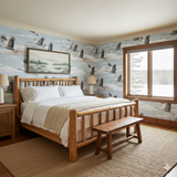Redwing Passage Wallpaper with a bird and cloud pattern on a bedroom wall.