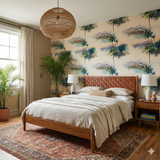 Griffith Mirage wallpaper with palm tree pattern, set within a bedroom interior.