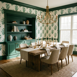 Green and white verdant stem register wallpaper with leaf pattern, styled in a dining room setting.
