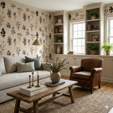Botanical wallpaper with floral pattern, featuring black leaves on a tan textured background.