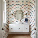 Patterned Penny Harbor Wallpaper with ribbon motif on off-white background.

