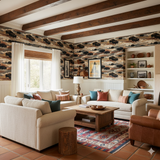 Bison Plains wallpaper with herd pattern on a wall, styled in a living room.
