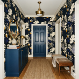 Floral wallpaper with blues and yellows, patterned with stylized botanical motifs.

