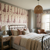 Marfa Promenade Wallpaper with a woman pattern, covering a bedroom wall with traditional wainscoting.