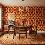 Retro hexagon wallpaper with an orange and brown pattern, decorating a dining room.
