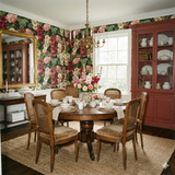 Floral wallpaper with pink and red flowers, floral motif, and leafy green foliage.