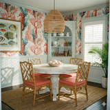 Coralbound wallpaper with a coral and seahorse pattern, covering a dining room wall.
