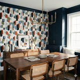 Midlake Shuffle wallpaper with a colorful geometric pattern, showcasing mid-century modern design in a dining room setting.
