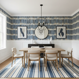 Bracken stripe wallpaper with blue vertical pattern on white, gold and blue background.