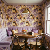 Floral wallpaper with dog pattern, Golden Reverie Wallpaper, on a cozy banquette area.